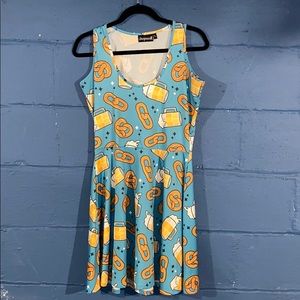 Sourpuss beers and pretzels fit and flare dress.
